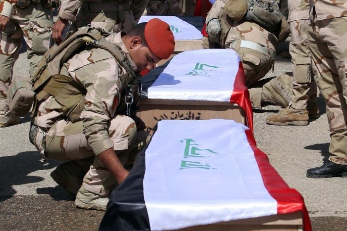 Iraq unearths 470 bodies from Tikrit mass graves - ảnh 1